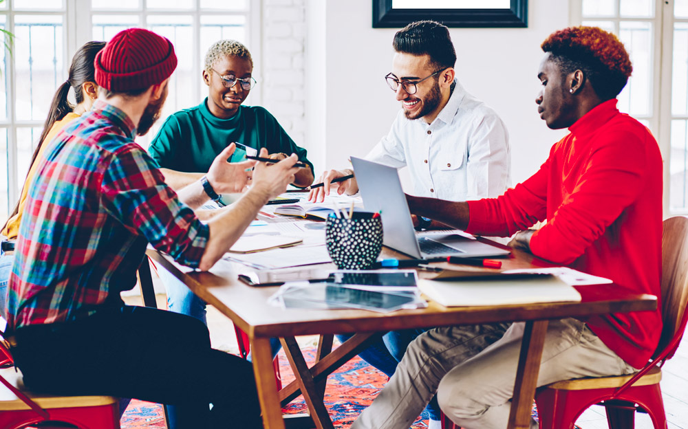 Group of adults having a meeting.